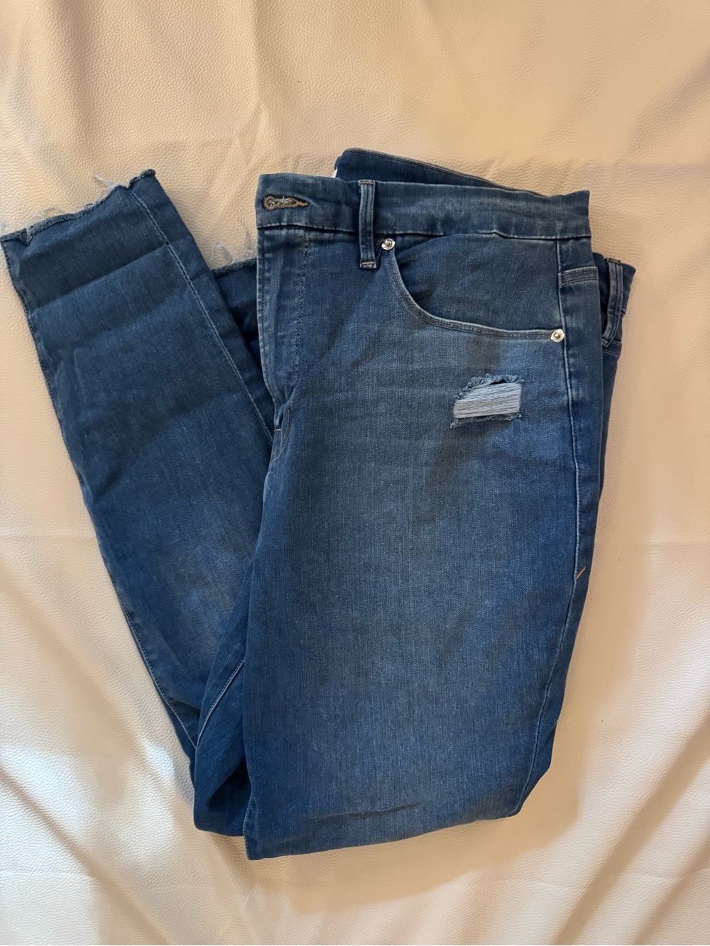 Good American Blue Jeans with Camo Pocket Lining
